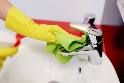 Cleaner maintaining a luxury apartment interior in Knightsbridge