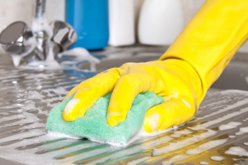Domestic cleaner working in a modern Knightsbridge apartment